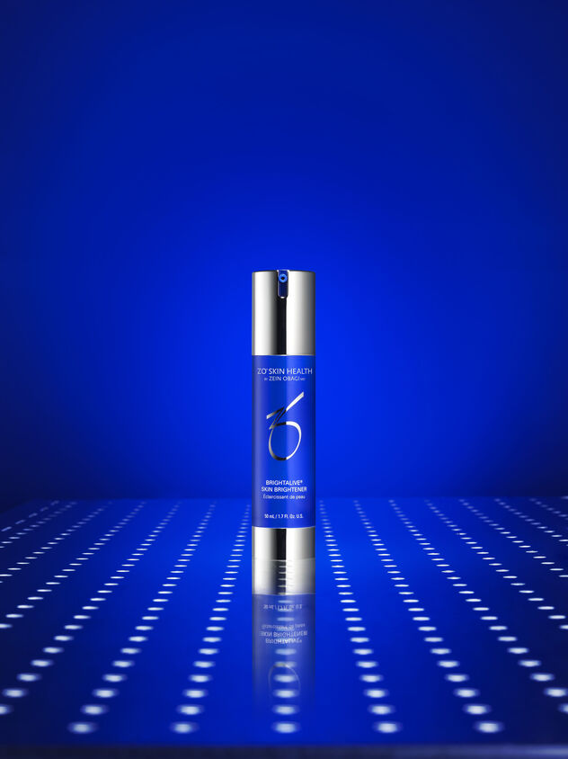 Brightalive&reg; Skin Brightener on a blue background